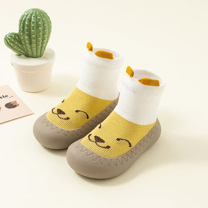 Zapato calcetín ergonómico para bebés color amarillo con blanco
